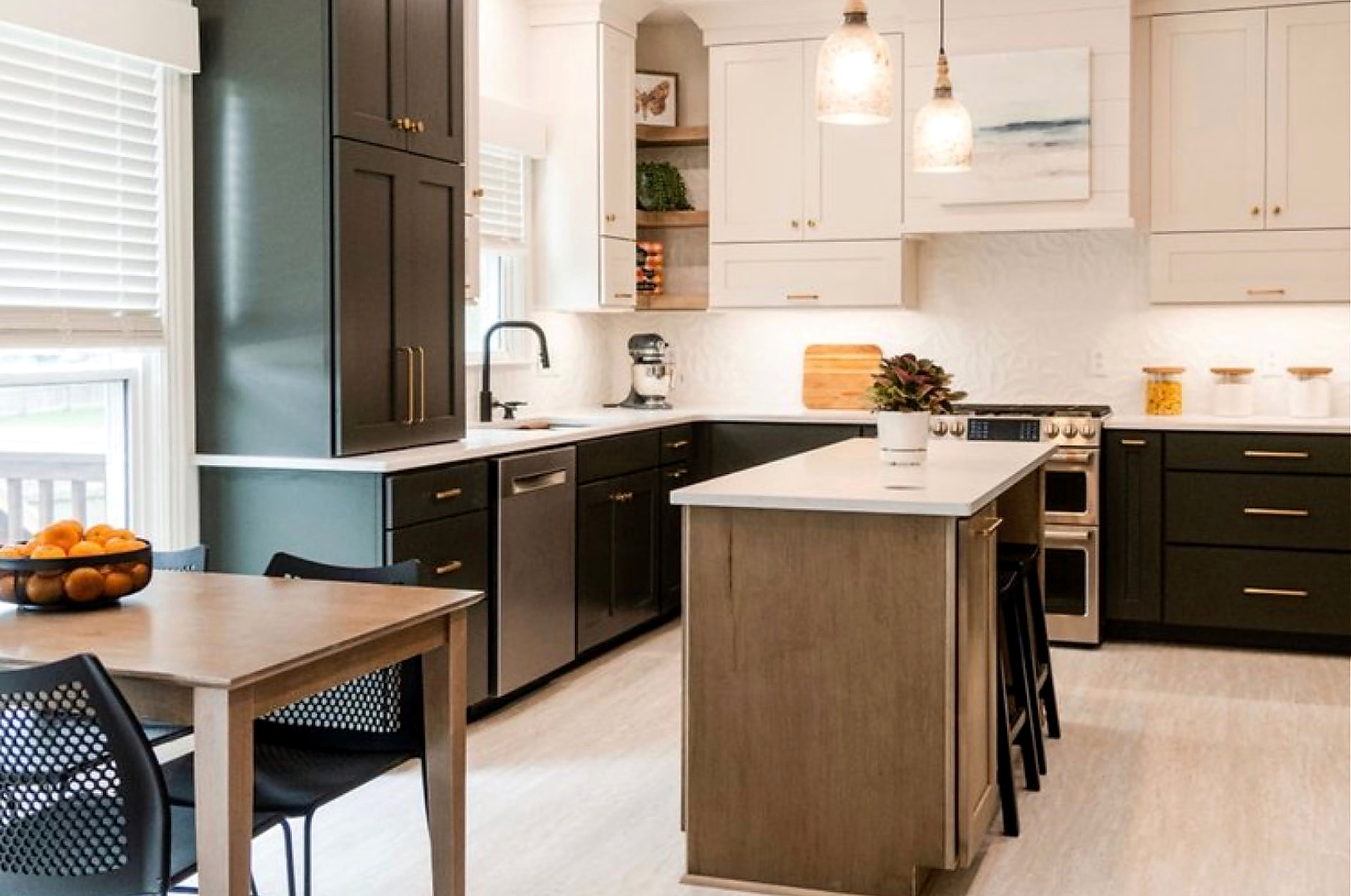 Open kitchen with light oak island and black cabinetry